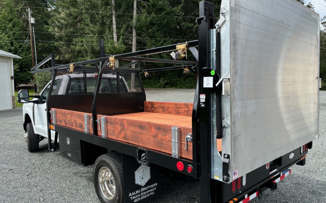 Flatbed with lumber rack and TommyGate for Patriot Fire