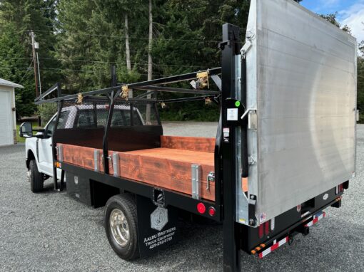 Flatbed with lumber rack and TommyGate for Patriot Fire